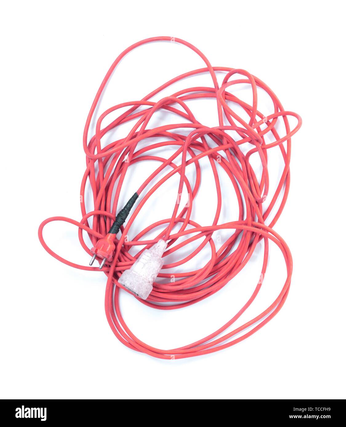 Extension cord, old and probably not safe anymore Isolated on white
