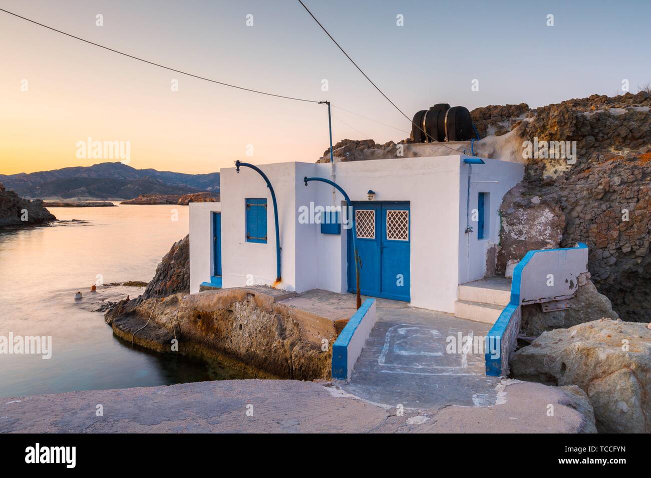 Boat houses in fishing village of Goupa on Kimolos island in Greece