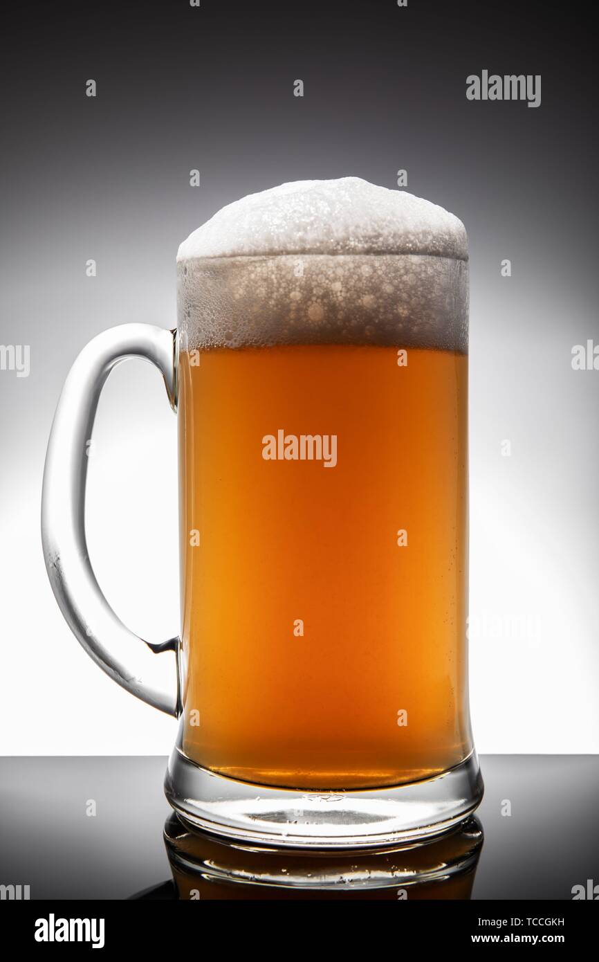 Frosted beer mug isolated on a white background Stock Photo - Alamy
