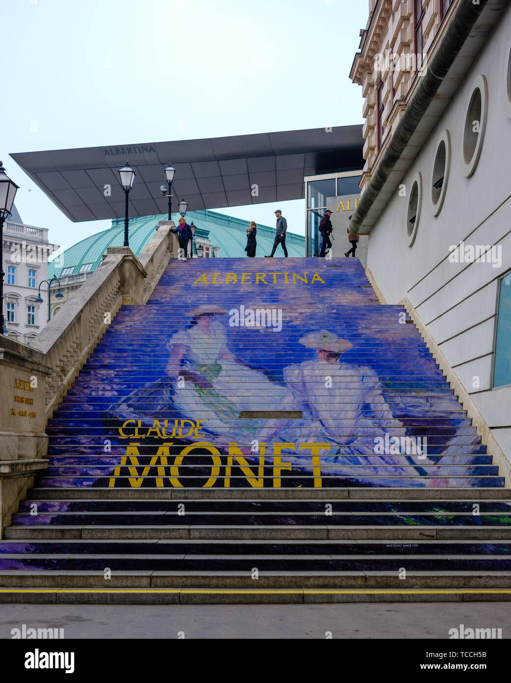 Steps up to the Albertina Museum and Art Gallery advertising an exhibition of works by Claude Monet in Vienna on 04/11/2018. Picture by Julie Edwards Stock Photo