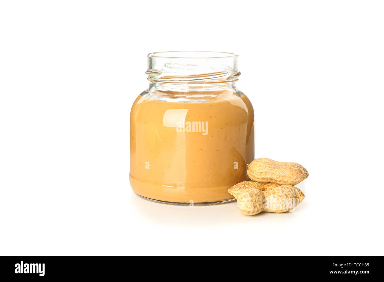 Jar with peanut butter and knife butter smear isolated on white background.  Ameriacan dessert concept Stock Photo - Alamy