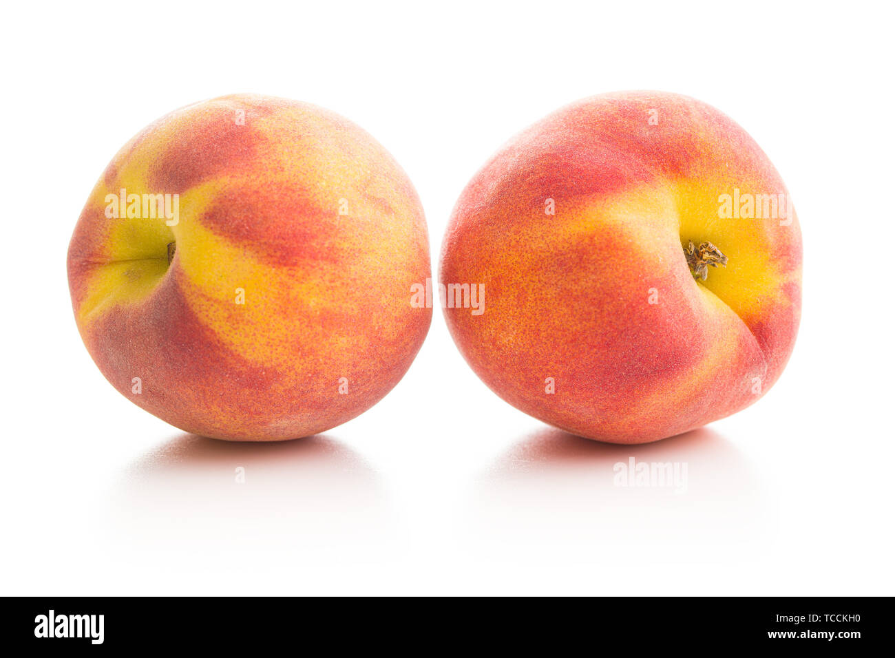 Sweet peaches fruit isolated on white background. Stock Photo