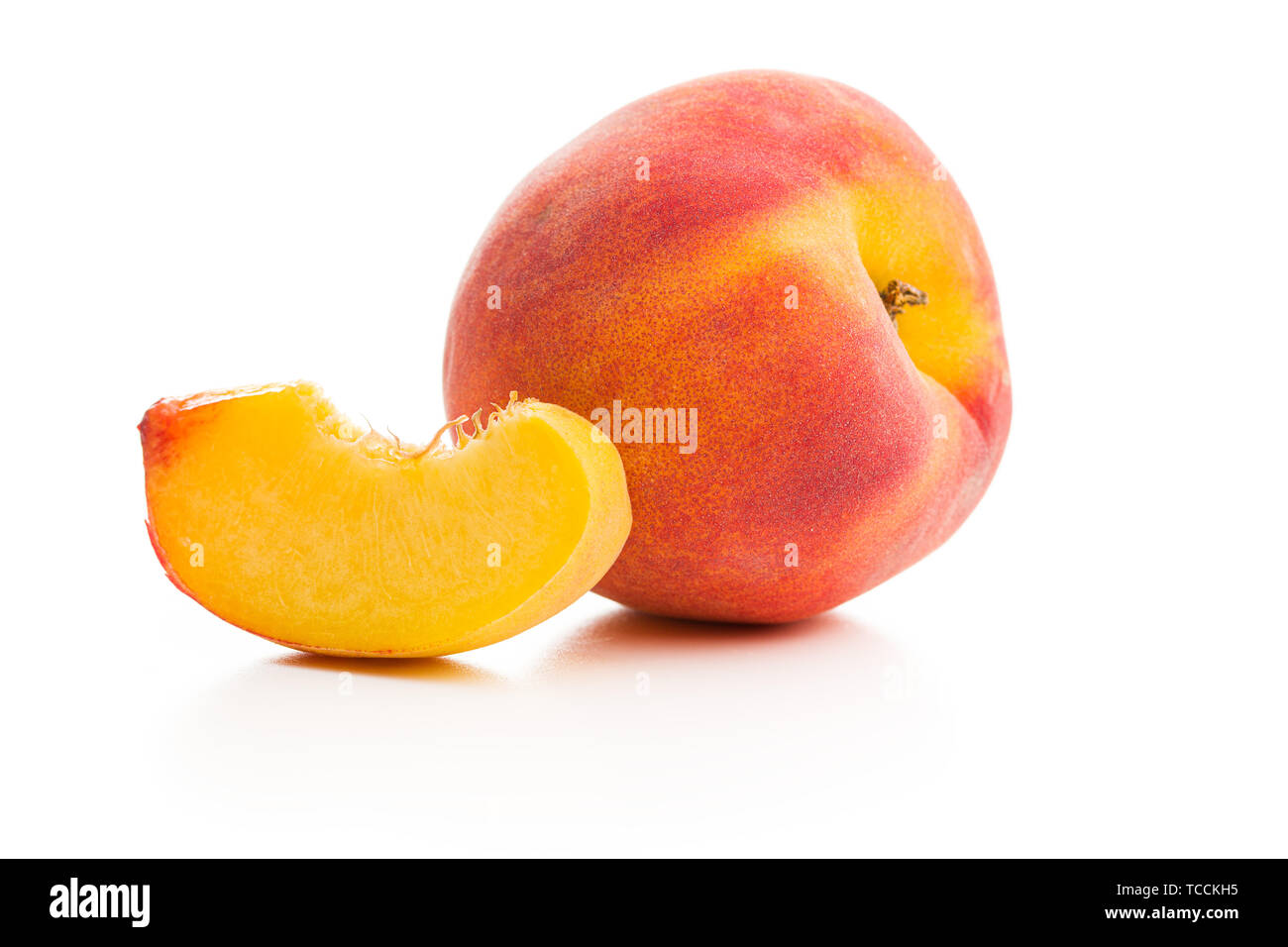Sweet peaches fruit isolated on white background. Stock Photo