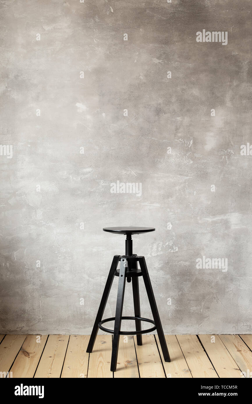 Bar Stool On The Gray Background Of The Wall Free Space For Text Stock Photo Alamy