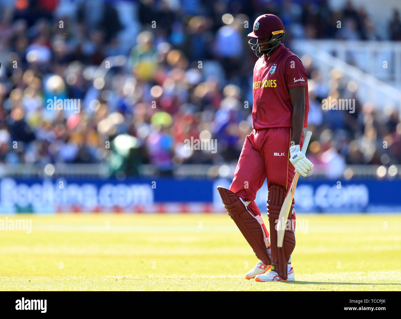 West Indies' Jason Holder walks off after being dismissed by Australia's Mitchell Starc during the ICC Cricket World Cup group stage match at Trent Bridge, Nottingham. Stock Photo
