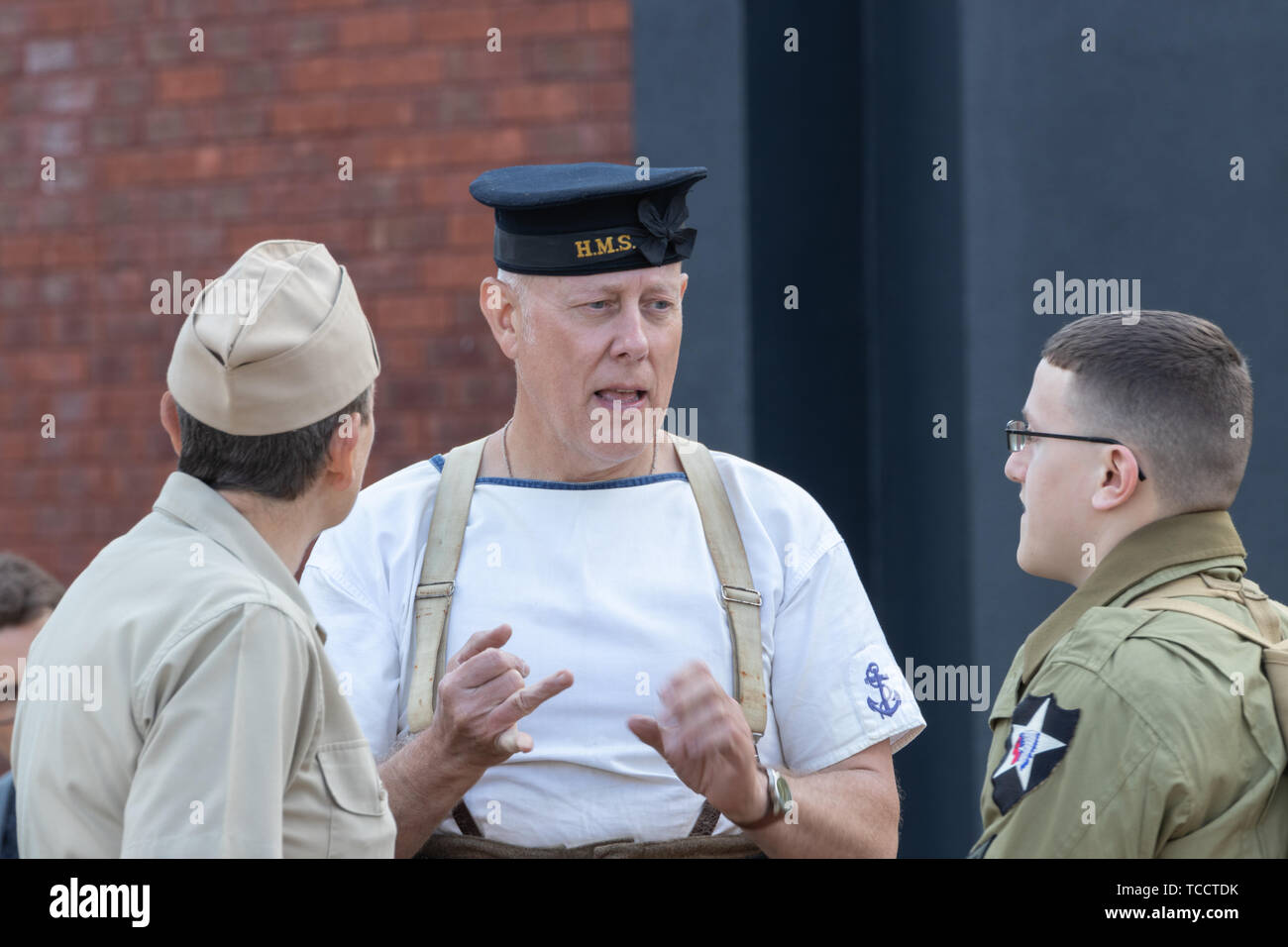 People dressed in vintage world war two military uniforms  during the D-day 75 commemorations in Portsmouth, People shots with period costumes Stock Photo