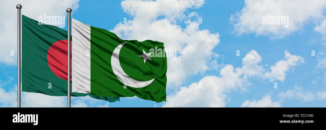 Bangladesh and Pakistan flag waving in the wind against white cloudy blue sky together. Diplomacy concept, international relations. Stock Photo