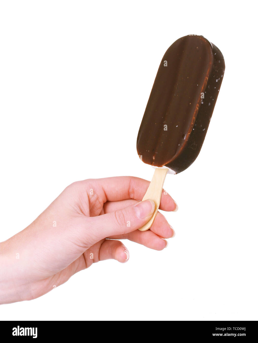 One chocolate vanilla ice cream  in hand isolated on white Stock Photo