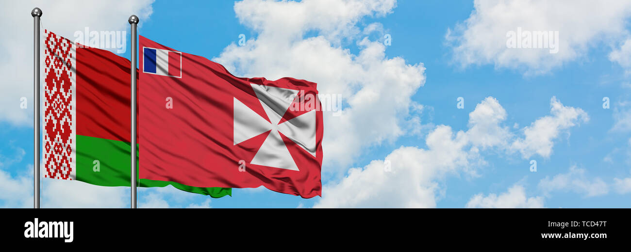 Belarus and Wallis And Futuna flag waving in the wind against white ...