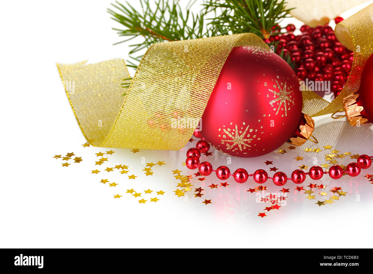 Christmas ball and green tree on white background Stock Photo - Alamy