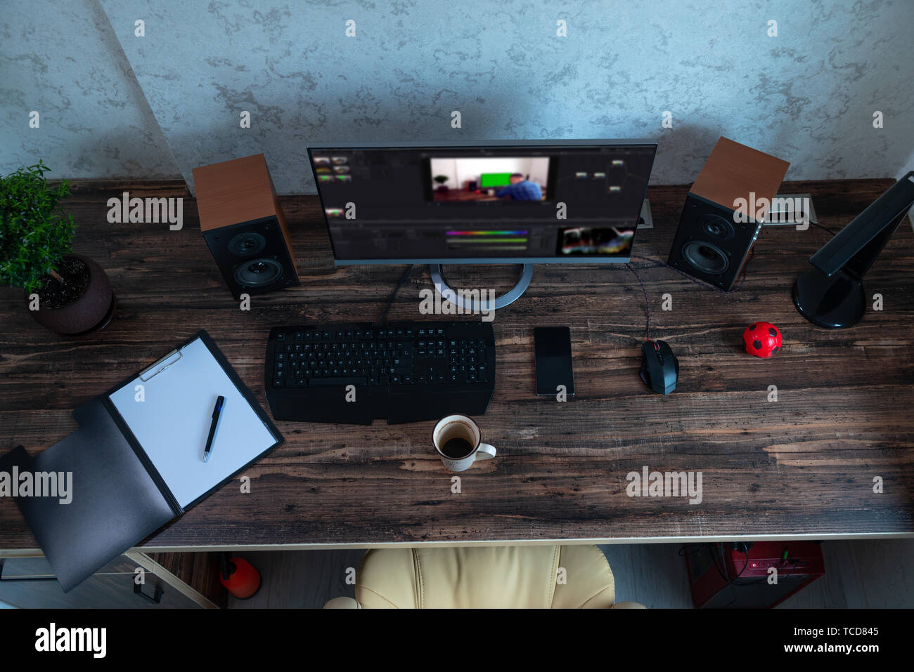 Top Down View On A Workstation In An Office With Large Desktop