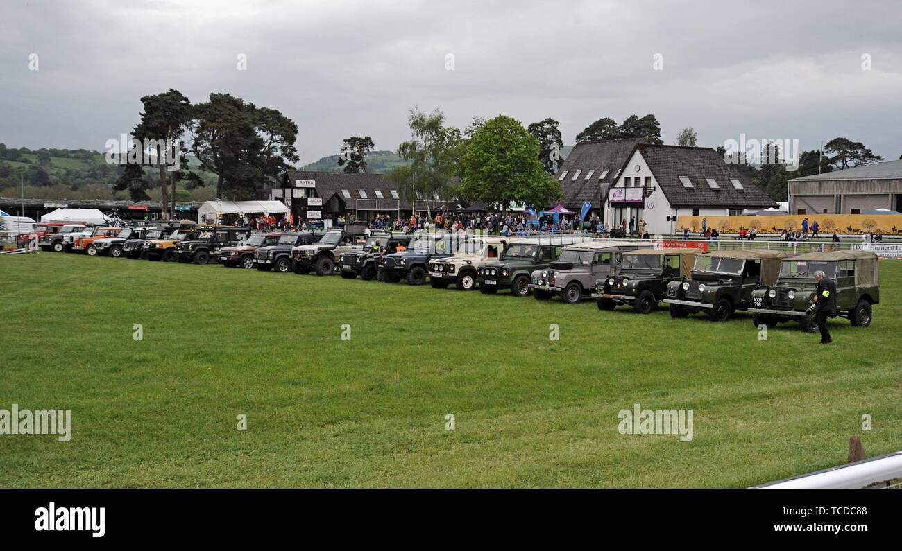 A display of Land Rovers old and new, including Series One, Defender and Discovery models  at the Royal Welsh Spring Festival Stock Photo