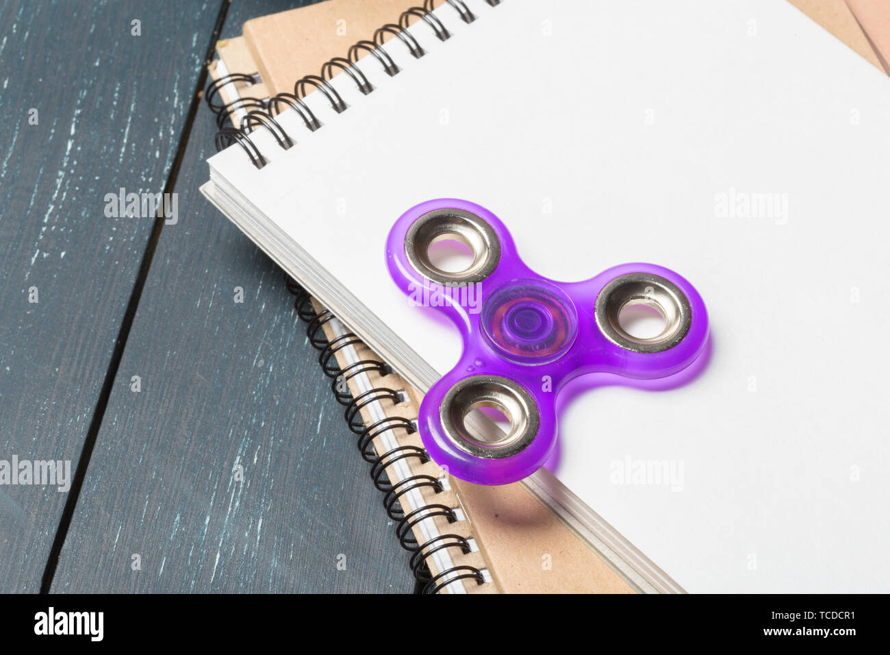Spinner Notebook Spinner on sheet paper hi-res stock photography and images - Alamy