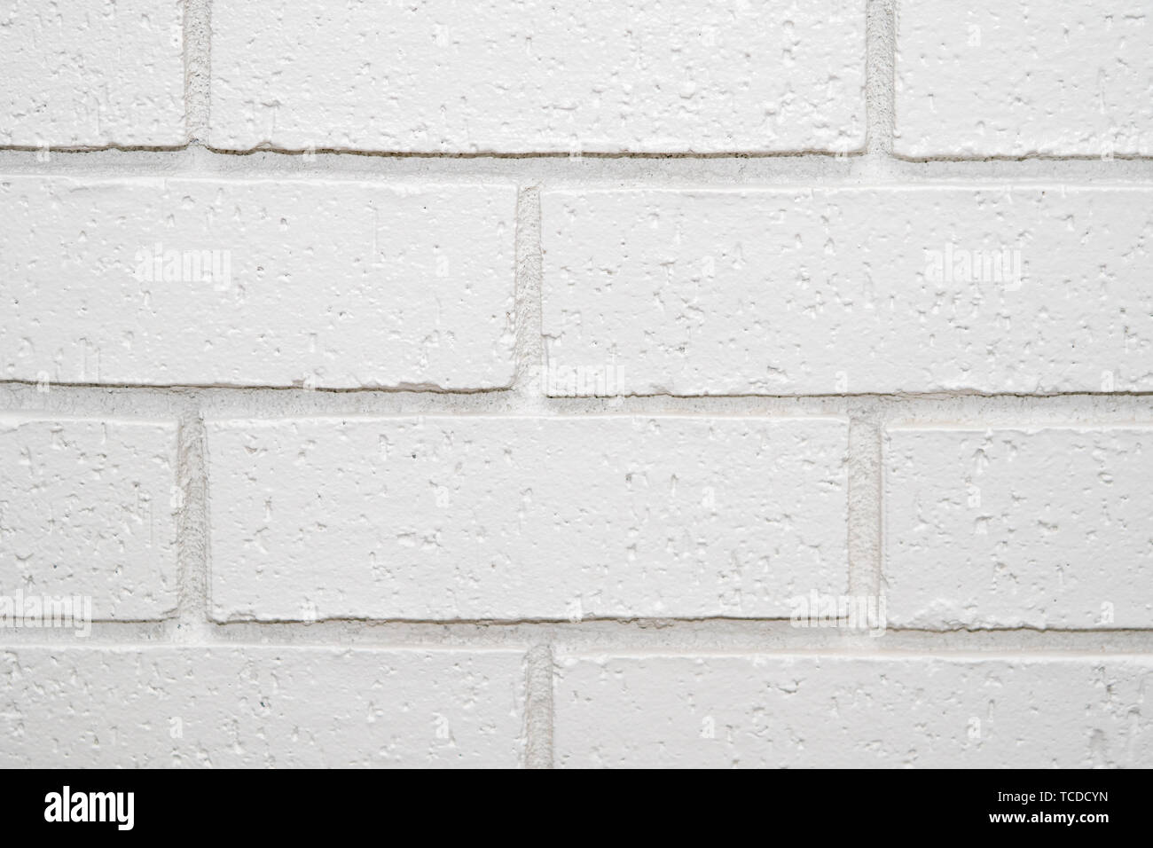 White painted on sale brick wall