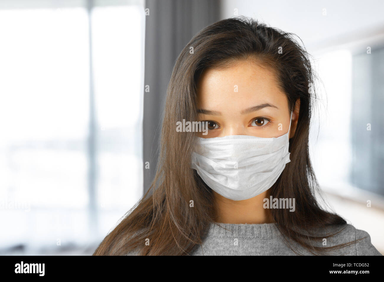 Woman wearing face mask Stock Photo Alamy