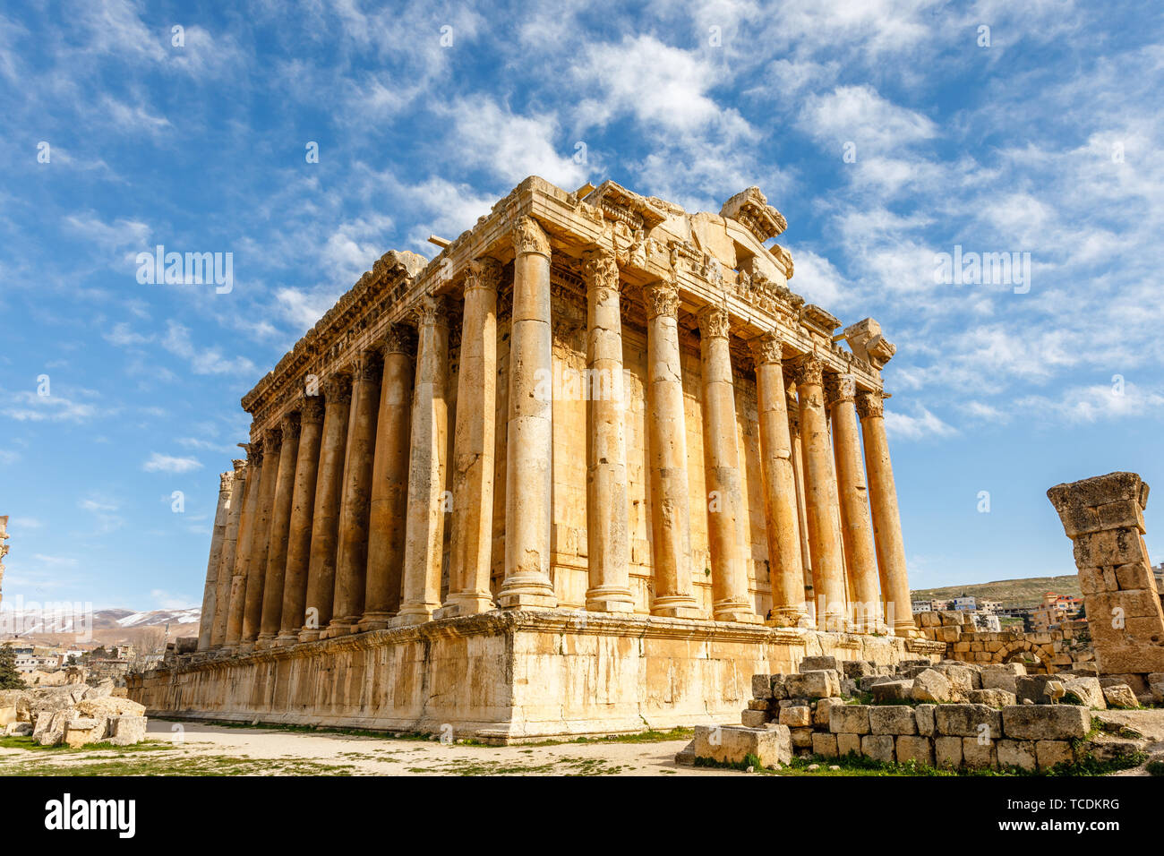 Ancient Roman temple of Bacchus with surrounding ruins and blue sky in ...