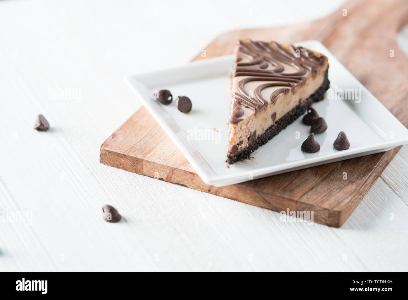 Chocolate peanut butter swirl cheesecake dessert Stock Photo - Alamy