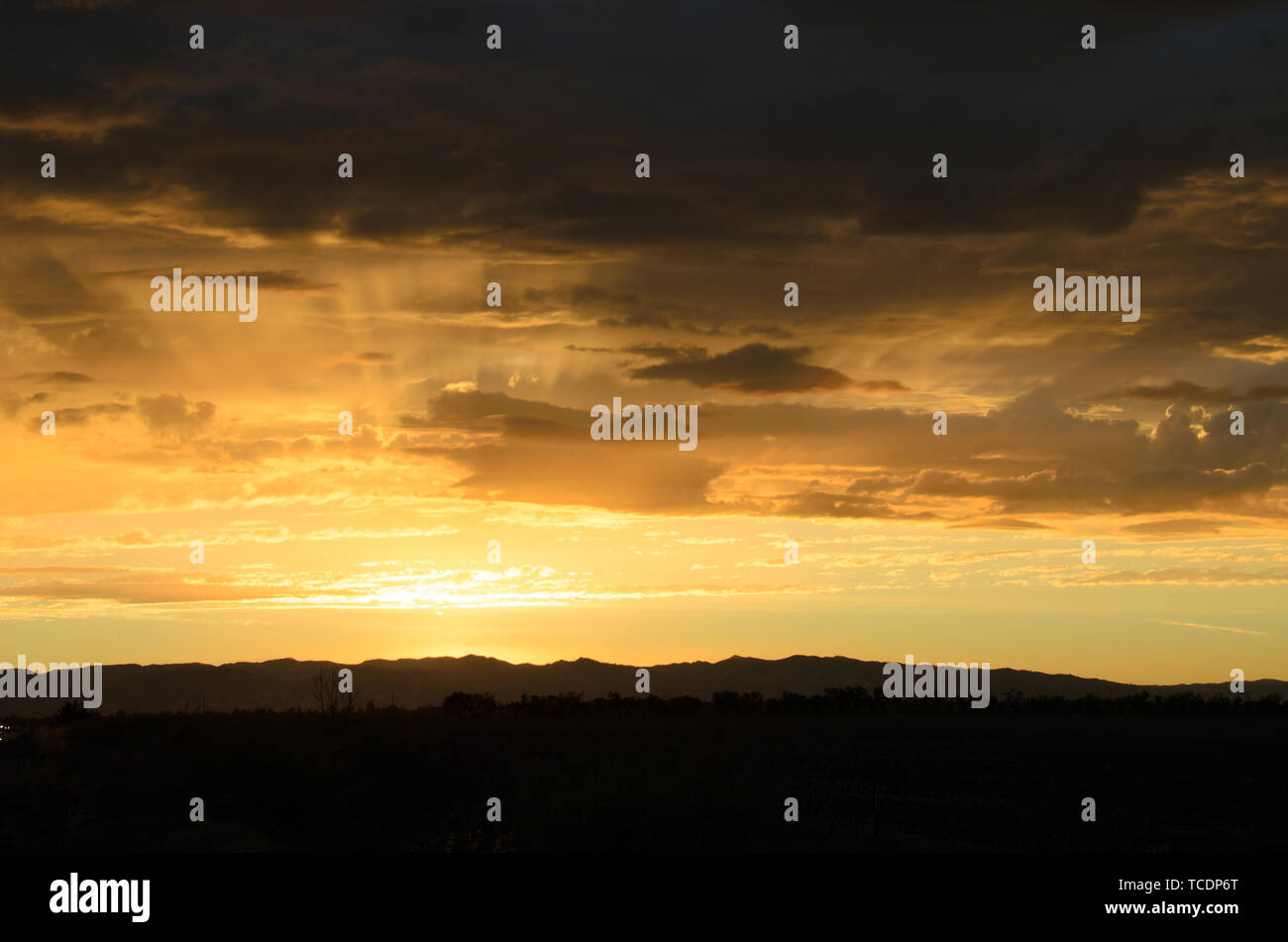 Yellow, sunset, clouds, weather, mountains, sunburst Stock Photo Alamy