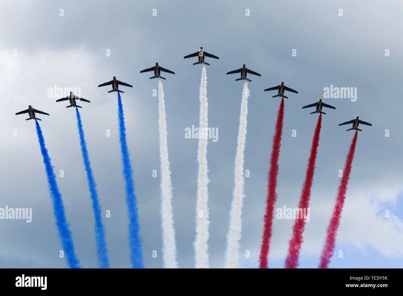 Military Aircraft Perform A Flyover Leaving Colored