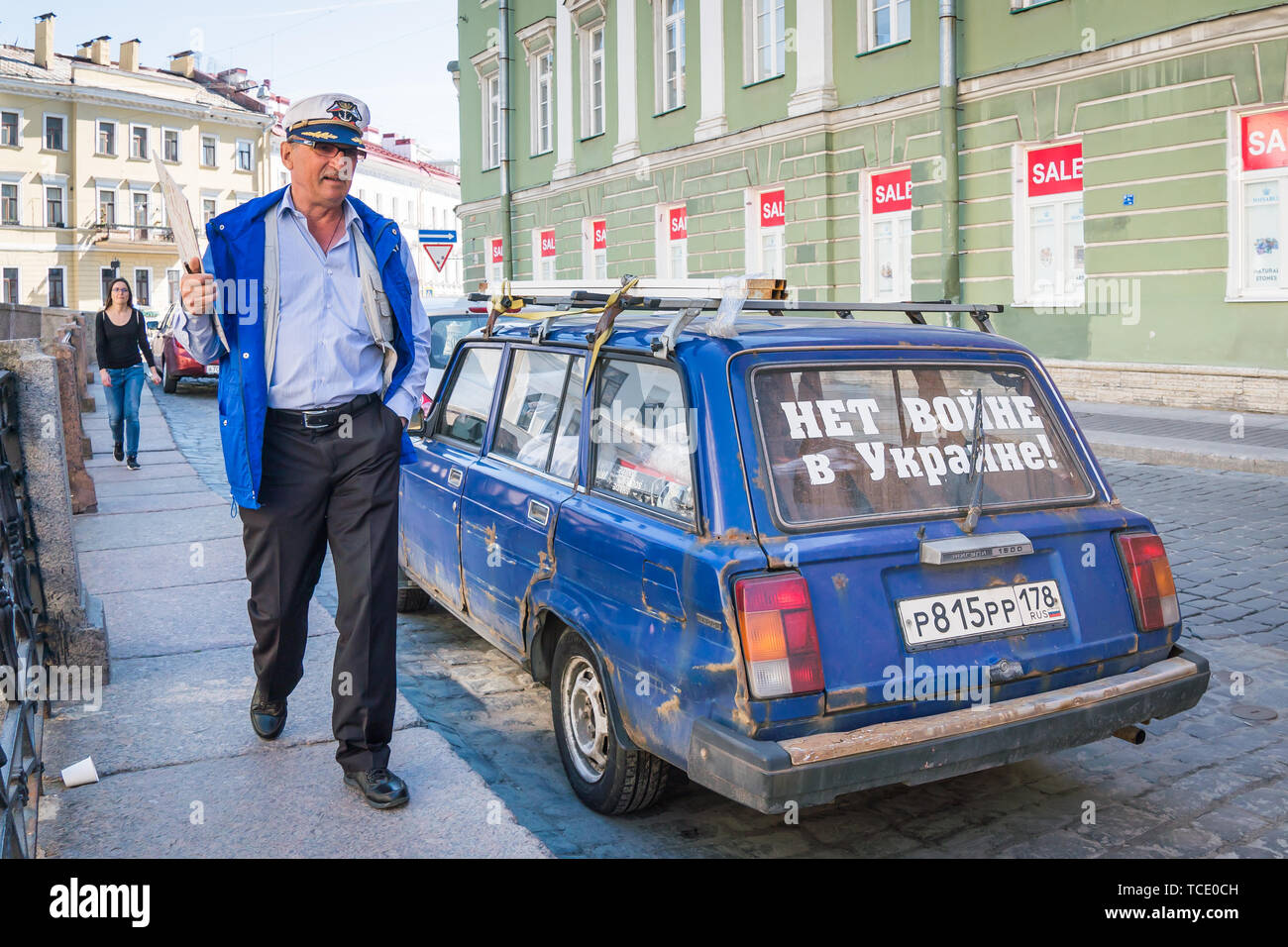 St.Peterburg, Russia - May 16, 2019 - an old car parked on a street with a sticker 'Say no to war in UKraine' Stock Photo