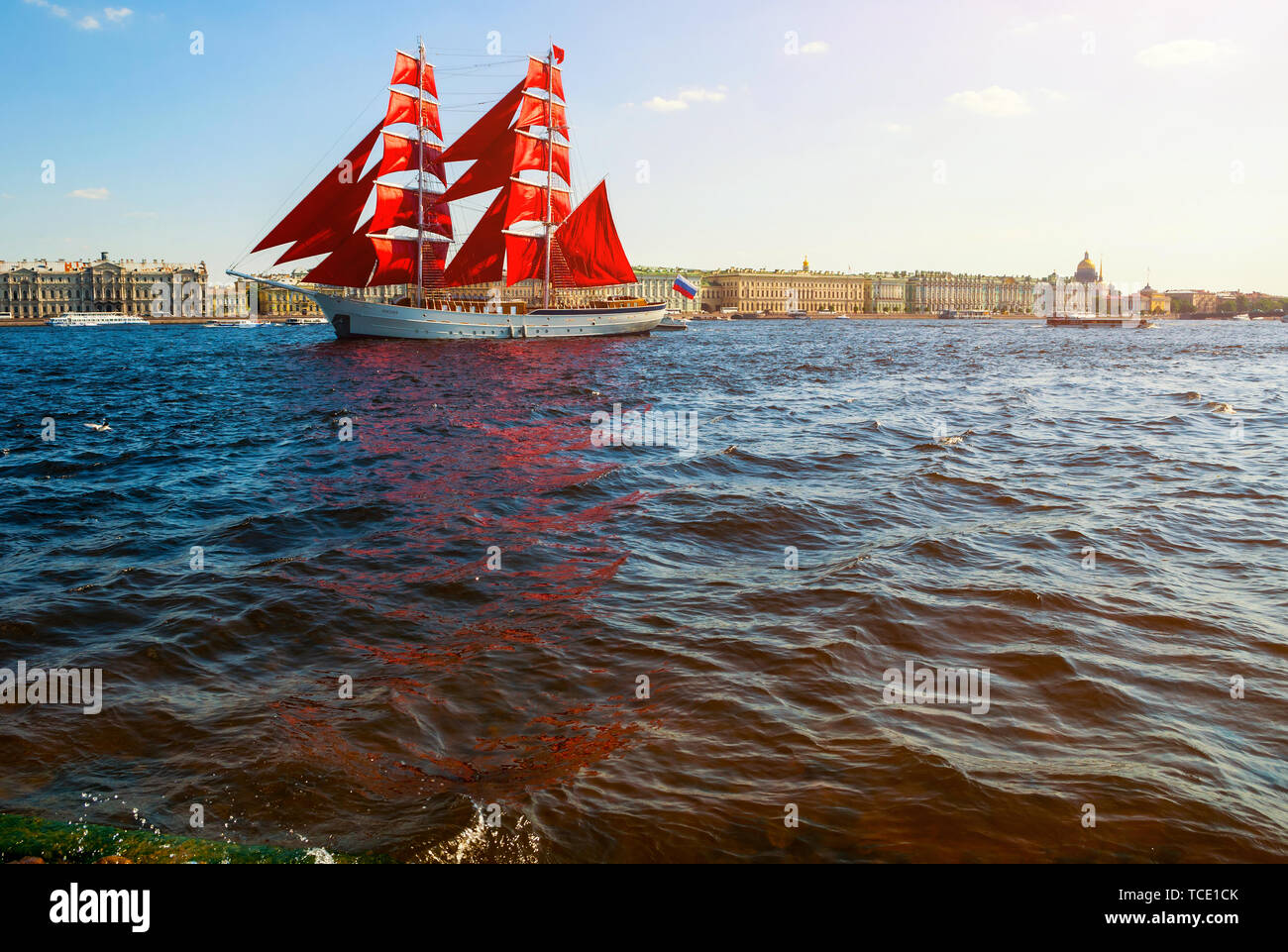 St Petersburg, Russia - June 6, 2019. Swedish brig Tre Kronor with Scarlet sails on the Neva river. Scarlet Sails is the Russian holiday of school gra Stock Photo