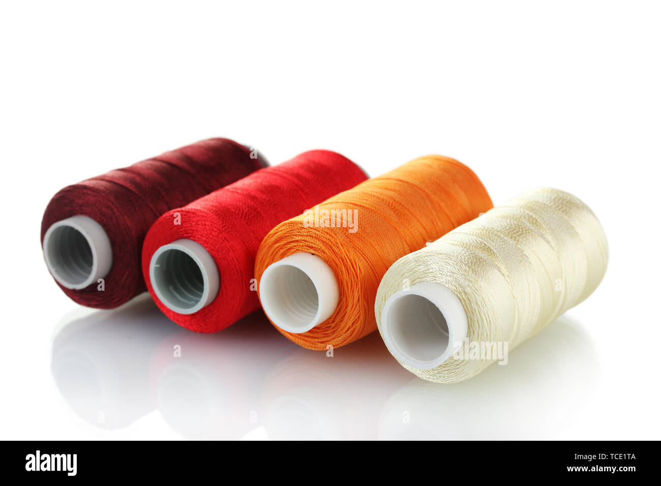 bright bobbin thread isolated on white Stock Photo