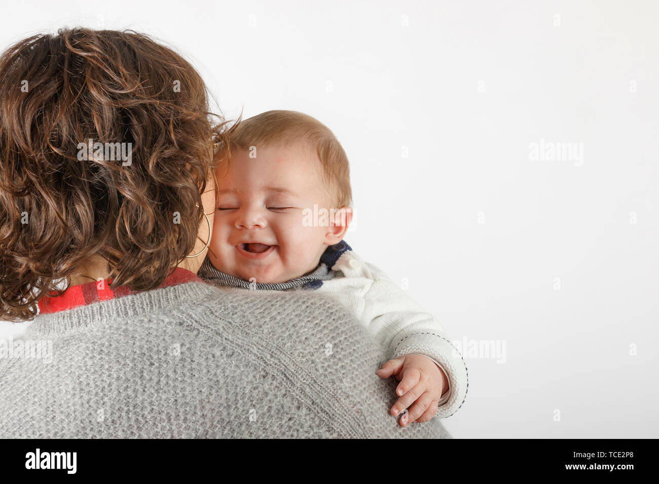 Woman holding a baby boy Stock Photo