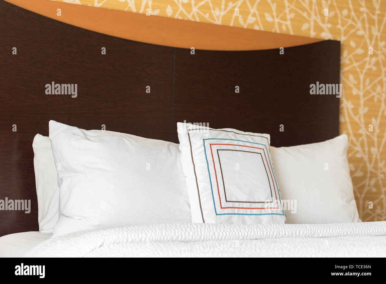 Retro square pillow bed spread white Stock Photo Alamy