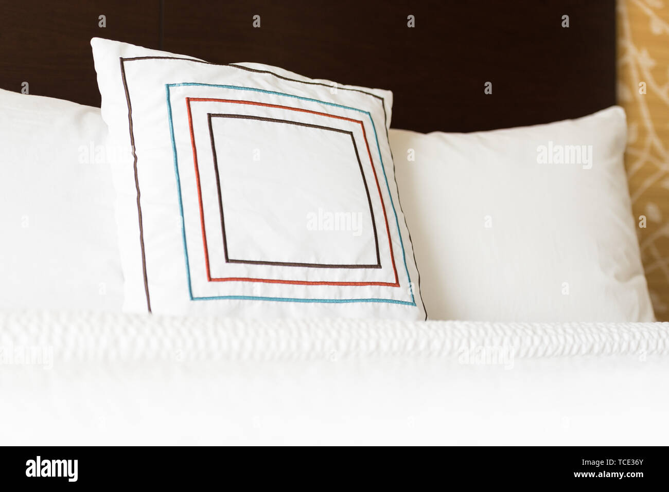 Retro square pillow bed spread white Stock Photo - Alamy