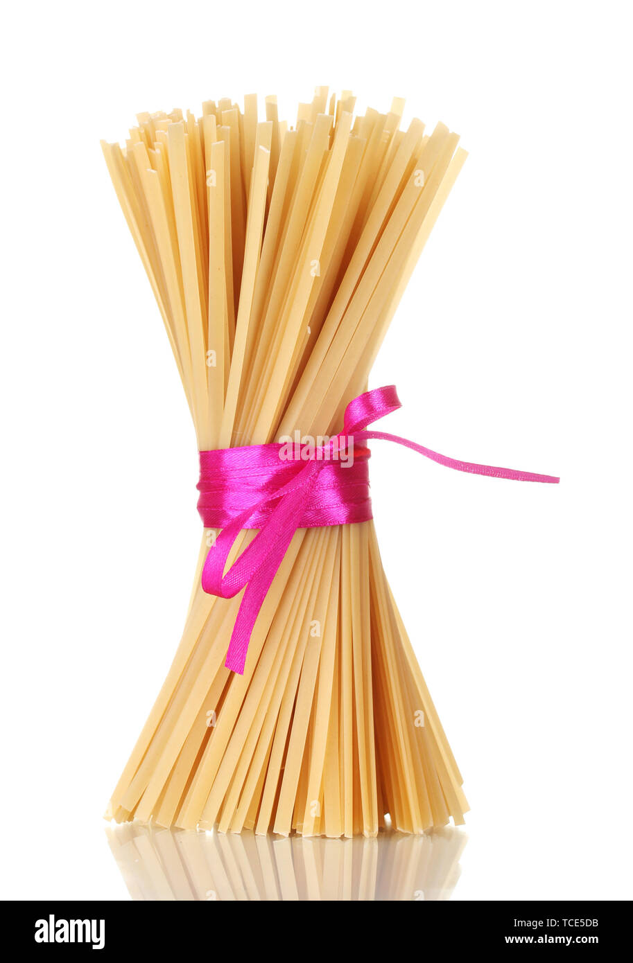 Spaghetti Ruby Ribbons Bunch of spaghetti with ribbon isolated on white Stock Photo - Alamy