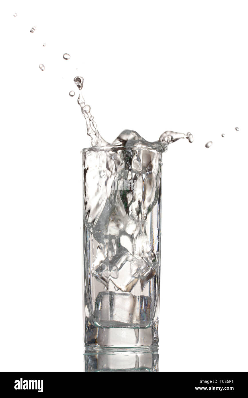fresh water in glass with ice cubes isolated on white Stock Photo - Alamy
