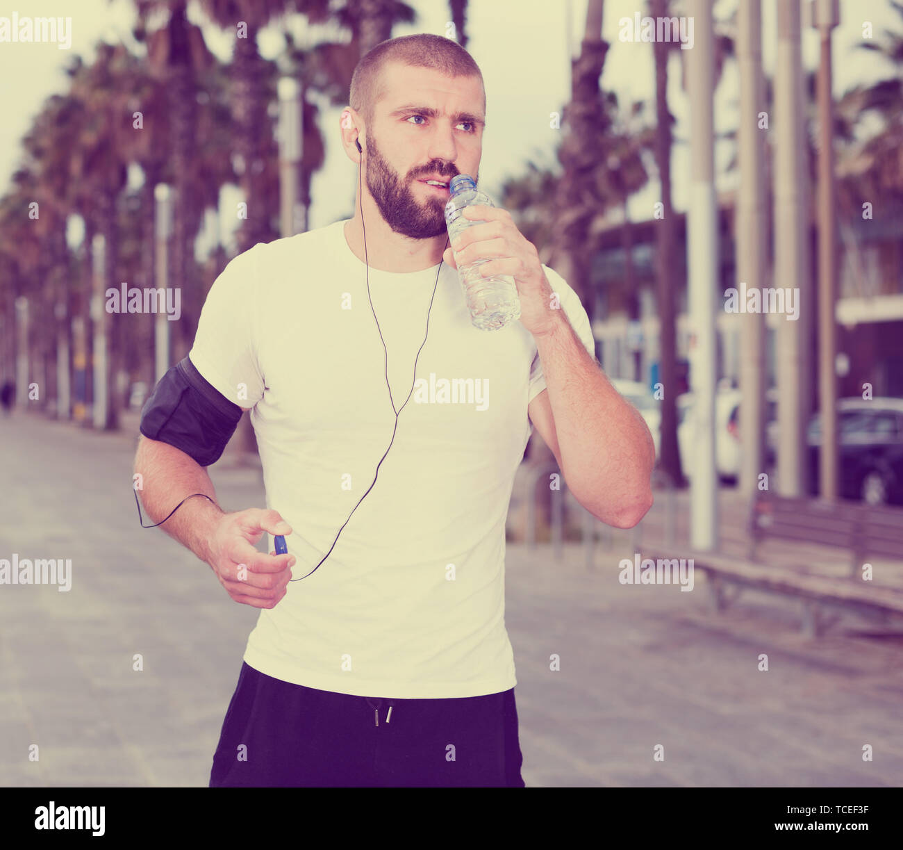 Sports man was out of breath during intense runs Stock Photo - Alamy