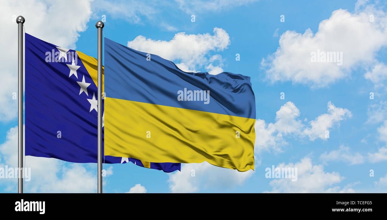Bosnia Herzegovina and Ukraine flag waving in the wind against white ...