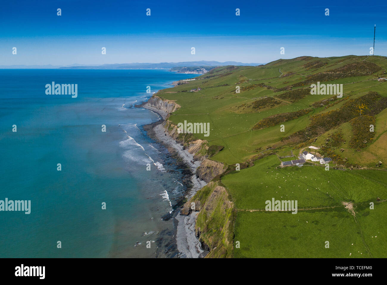 Mynachdy'r Graig, an isoloated and remote farm and buildings sitting close to the dramatic sea cliffs just south of Aberystwyth, land part owned by the National Trust,  on the Welsh Coastal path, west Wales UK Stock Photo