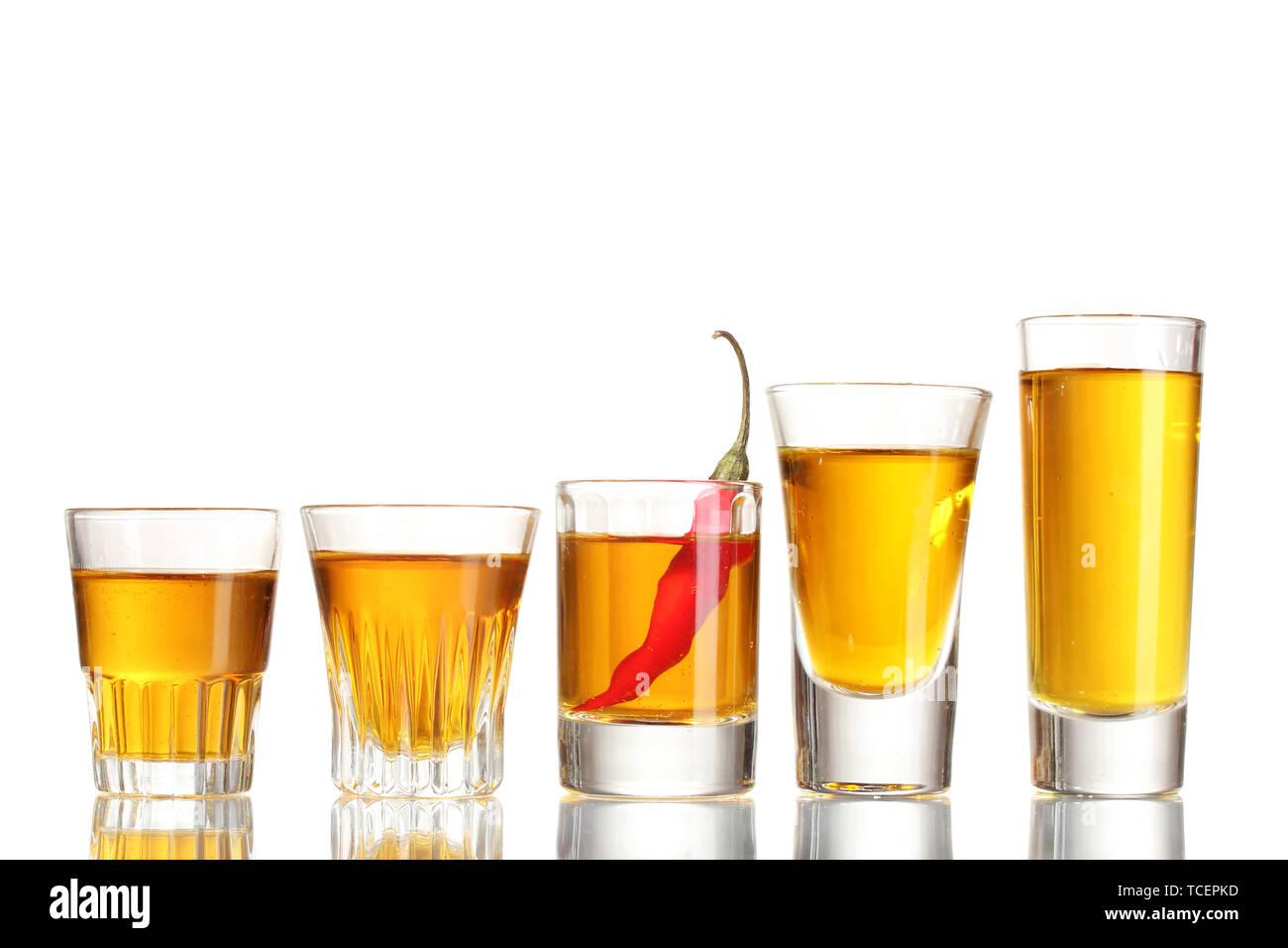 glasses of pepper vodka and red chili pepper isolated on white Stock Photo Alamy