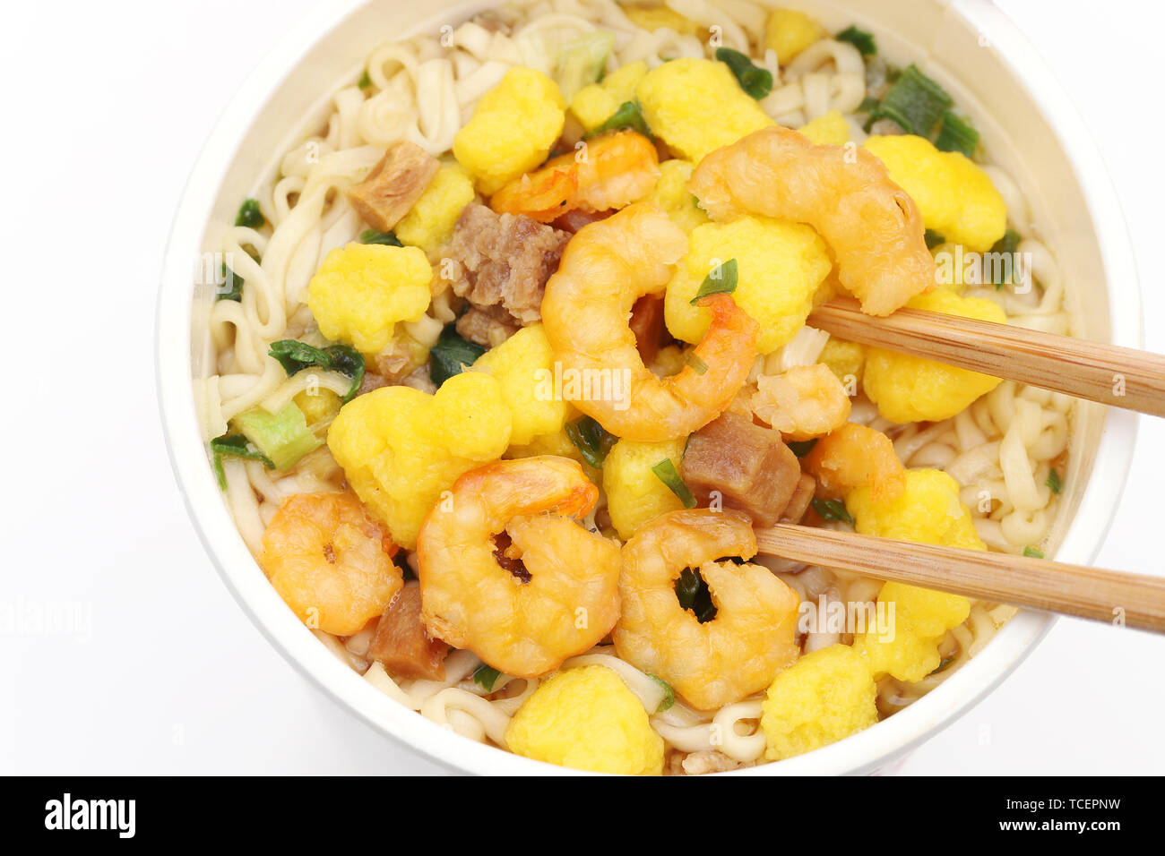 Instant noodles, noodle soup in a cup with chopsticks Stock Photo Alamy