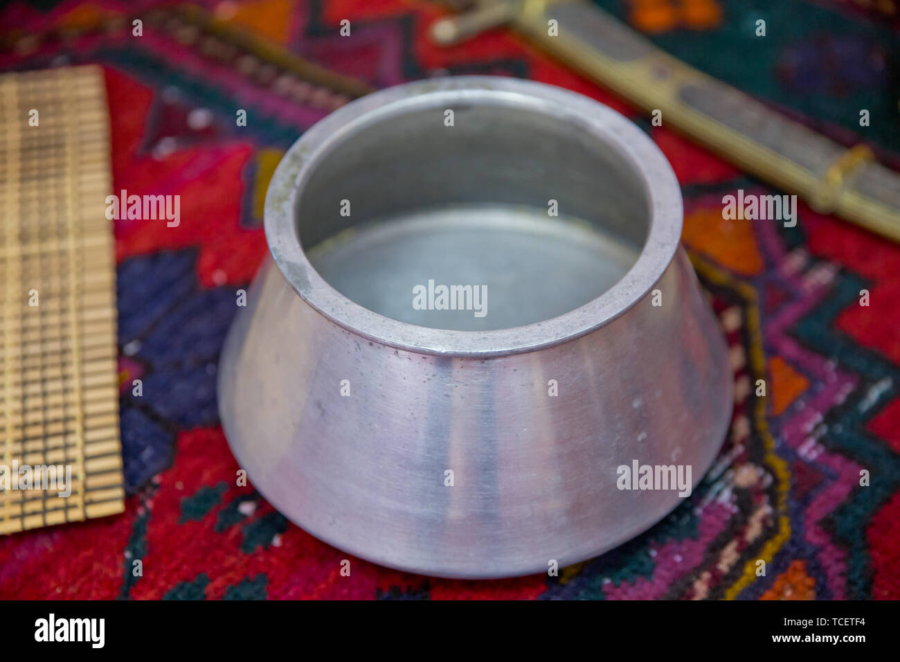 Old cast iron .Modern Clean Classic Cast Iron Dutch Oven Or Pot With Pan Cover. Stock Photo