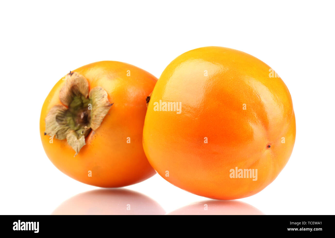 Two appetizing persimmons isolated on white Stock Photo
