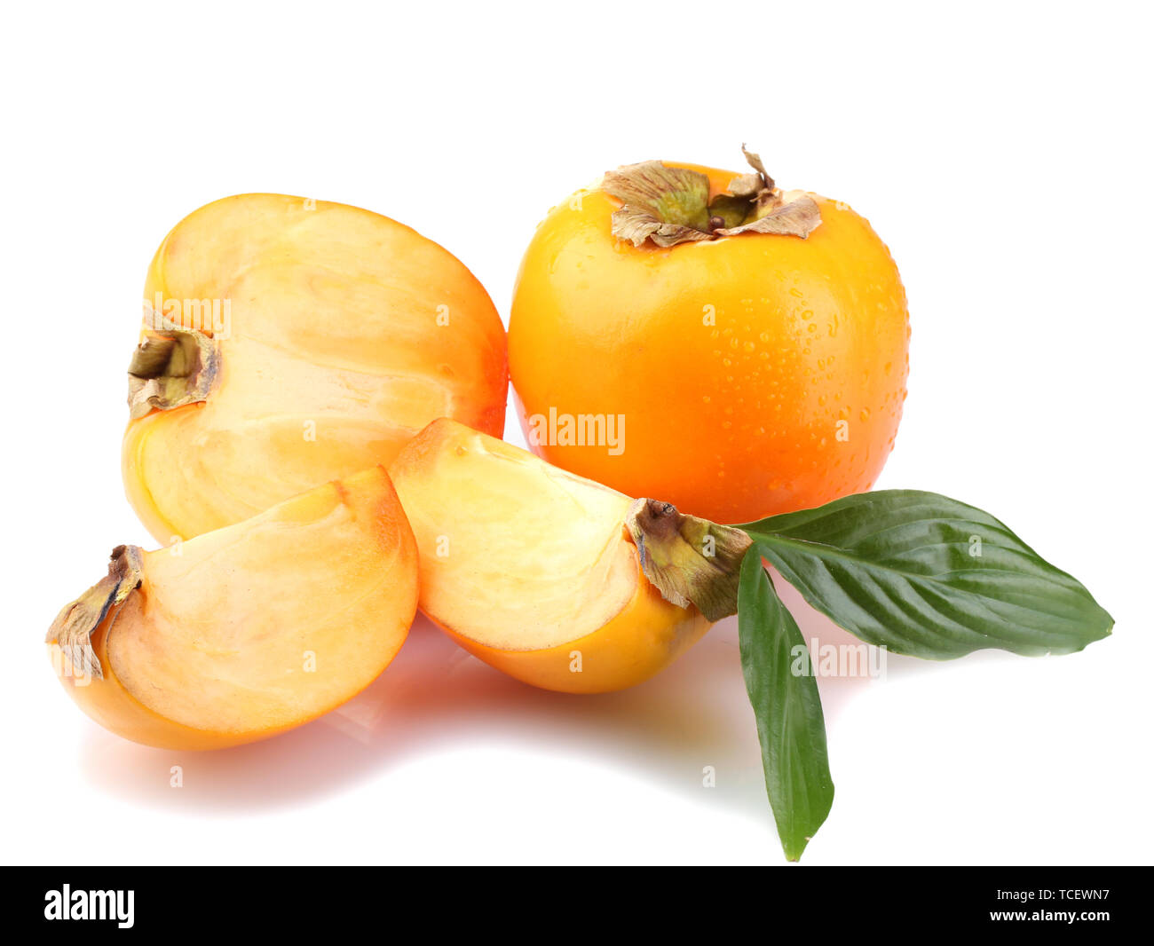 Appetizing persimmons with droplets isolated on white Stock Photo