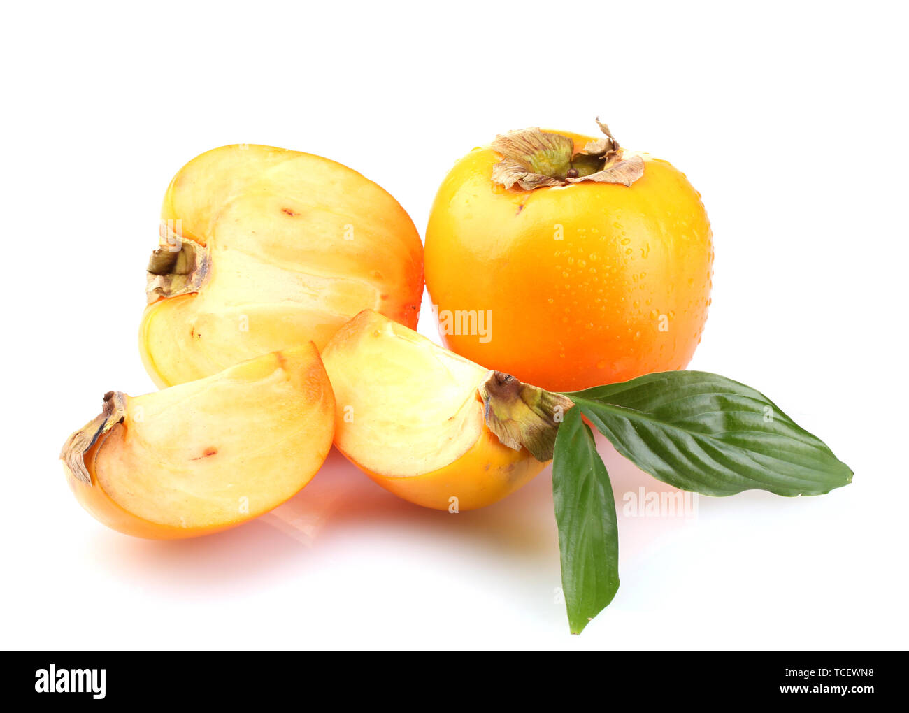 Appetizing persimmons with droplets isolated on white Stock Photo