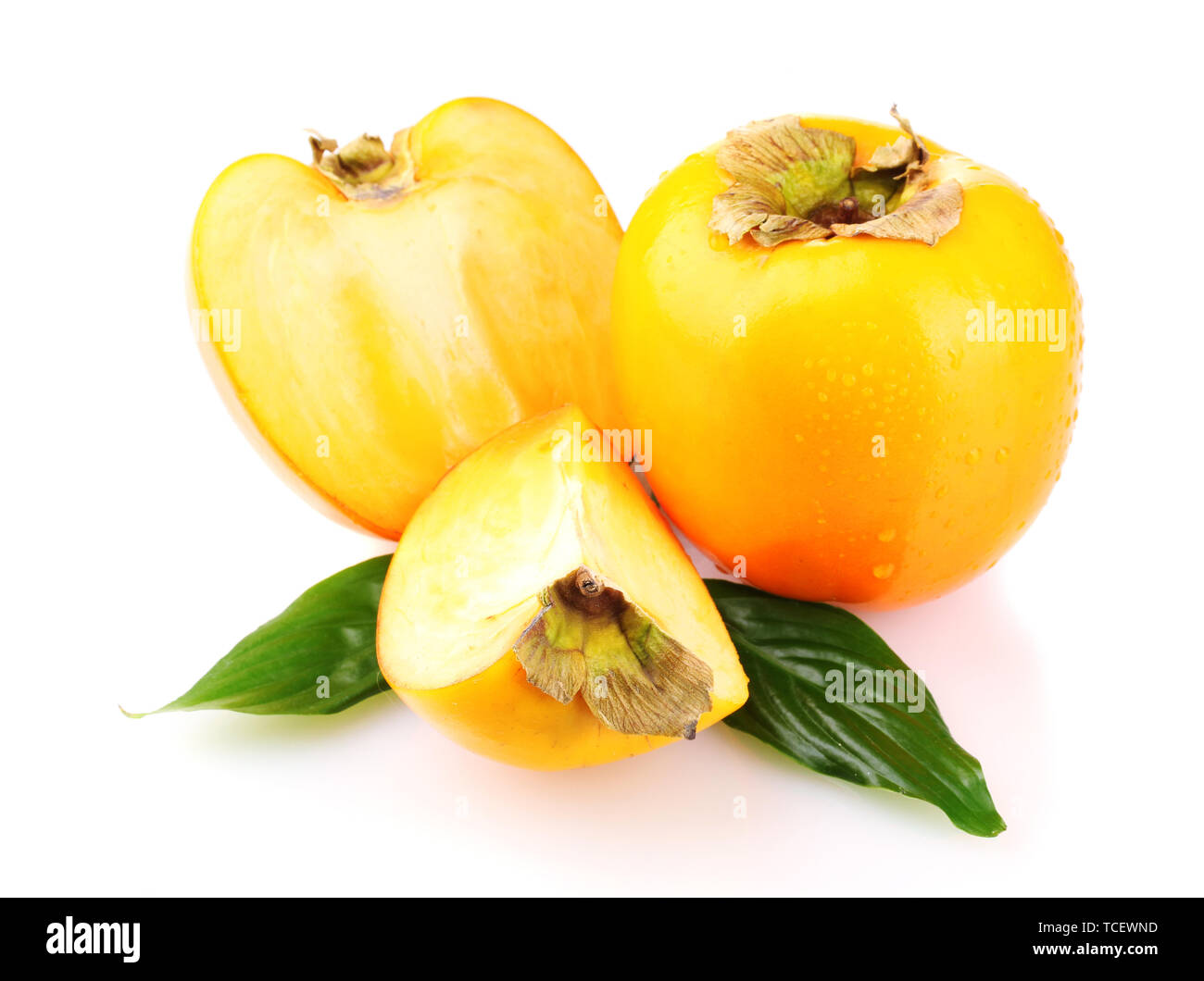 Appetizing persimmons with droplets isolated on white Stock Photo