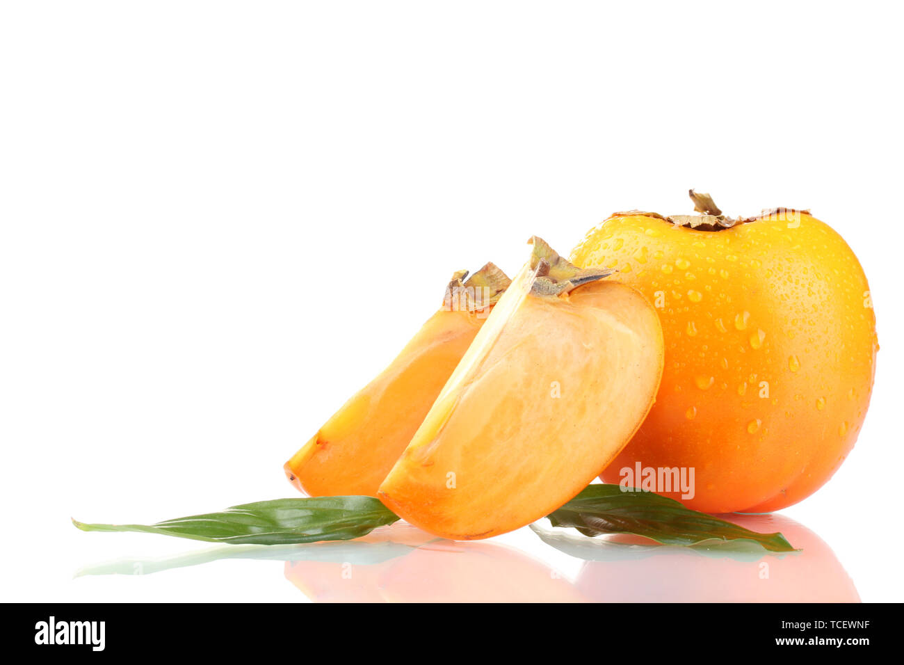 Appetizing persimmons with droplets isolated on white Stock Photo