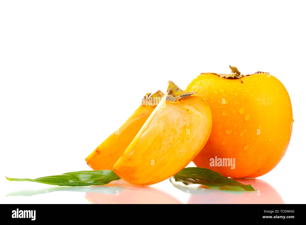 Appetizing persimmons with droplets isolated on white Stock Photo