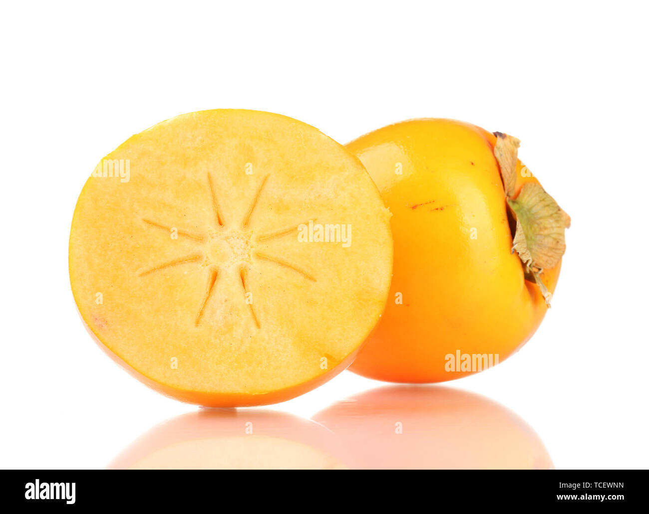 Appetizing persimmons with droplets isolated on white Stock Photo