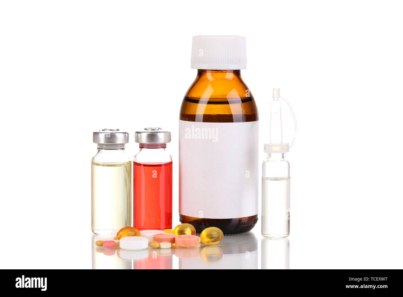 Medical bottles with tablets and ampoules isolated on white Stock Photo