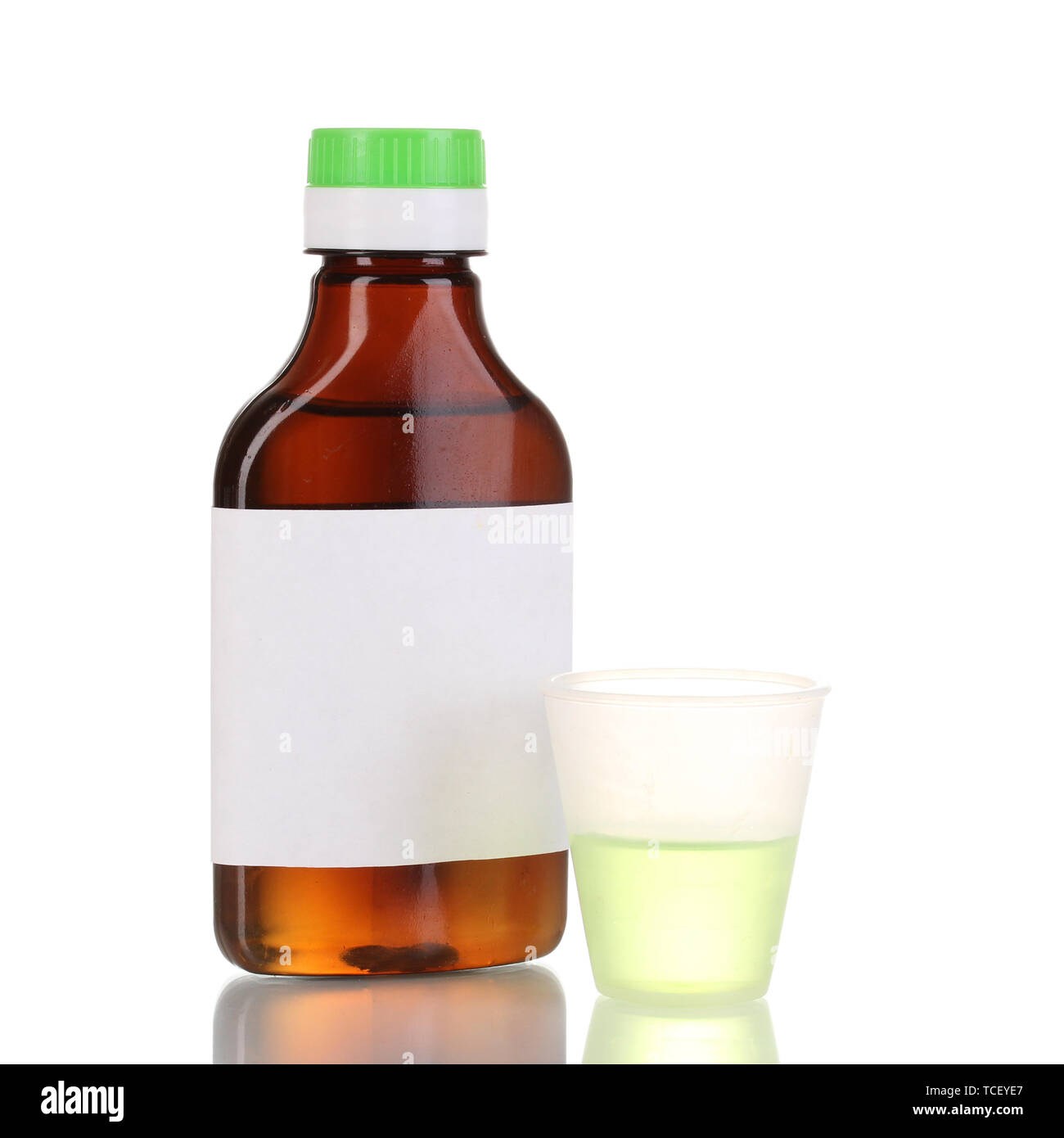 Medical bottle and jigger isolated on white Stock Photo Alamy