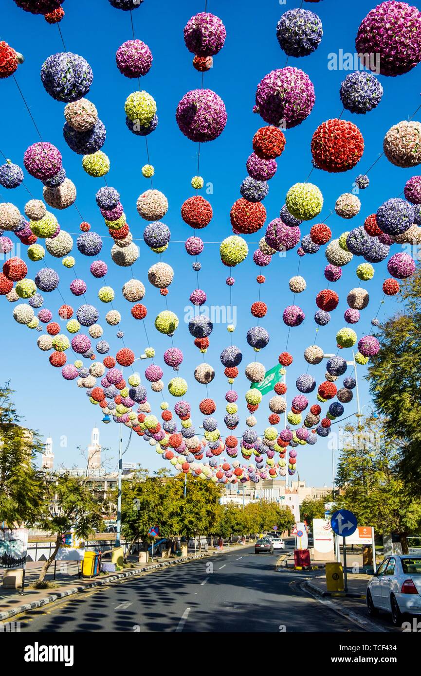 Colourful balls hanging above a street, Abha, Saudi Arabia Stock Photo