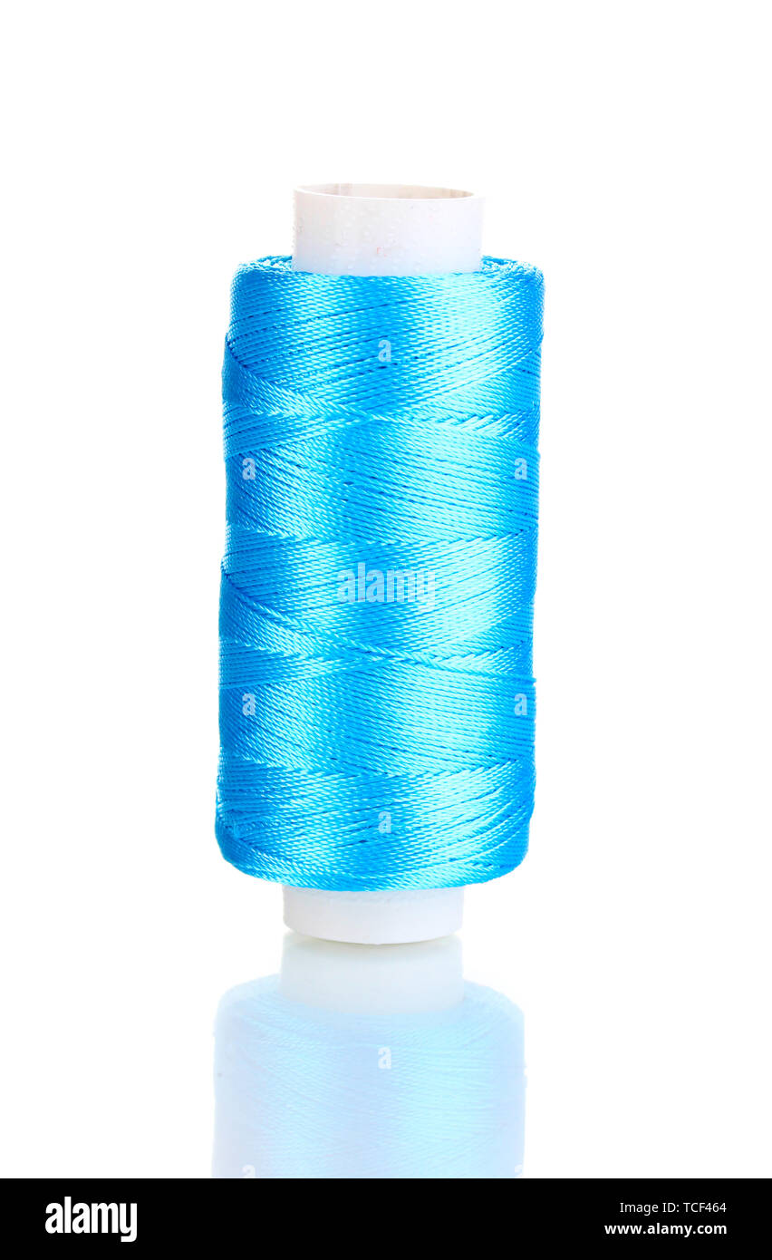 Blue bobbin thread isolated on white Stock Photo Alamy
