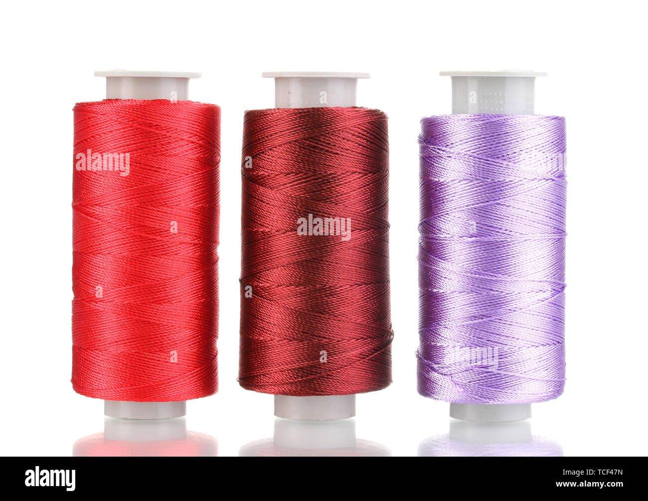 Three bobbin thread isolated on white Stock Photo Alamy