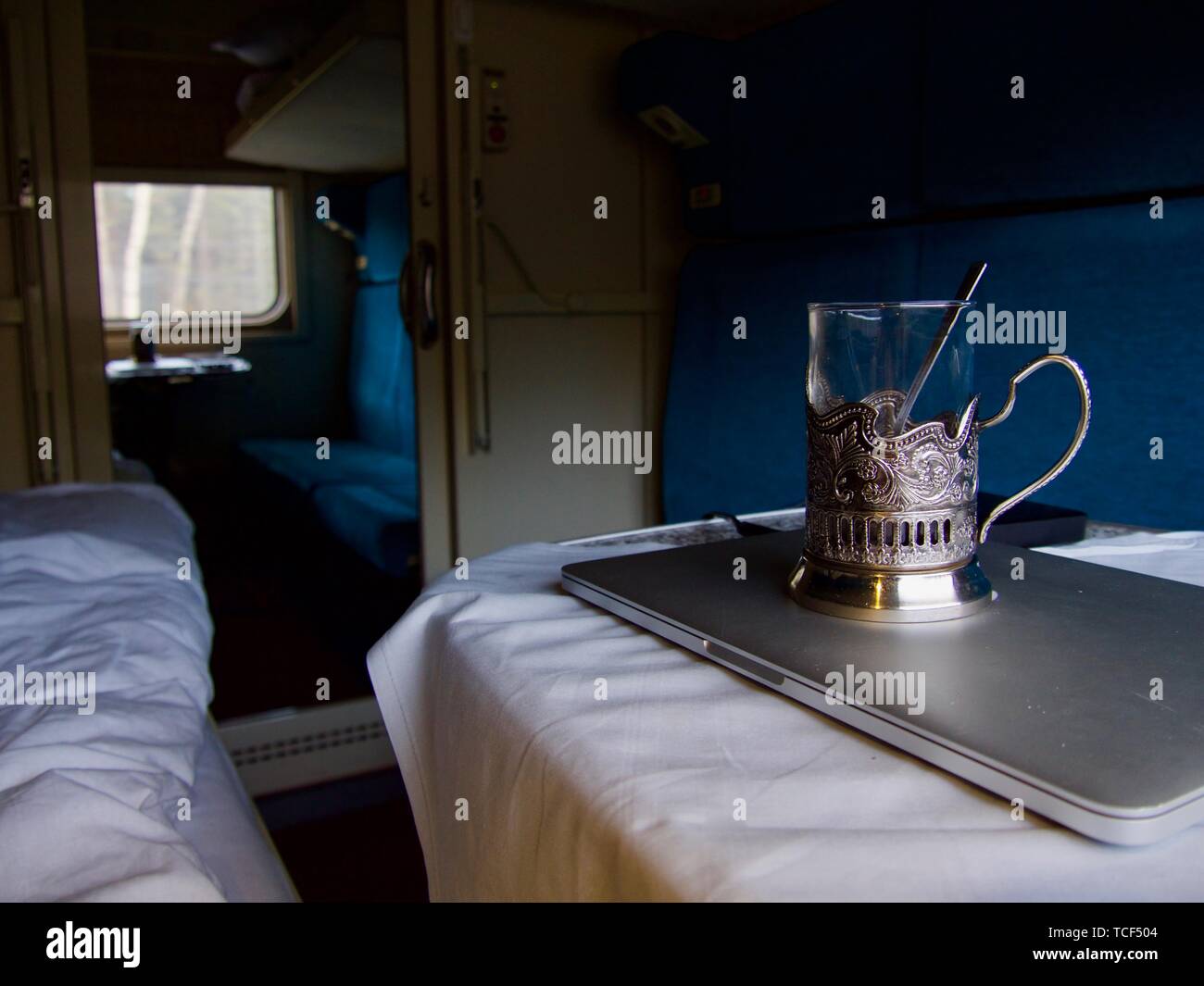 Classic Tea drinking in a russian train, Transsibirisk road Stock Photo